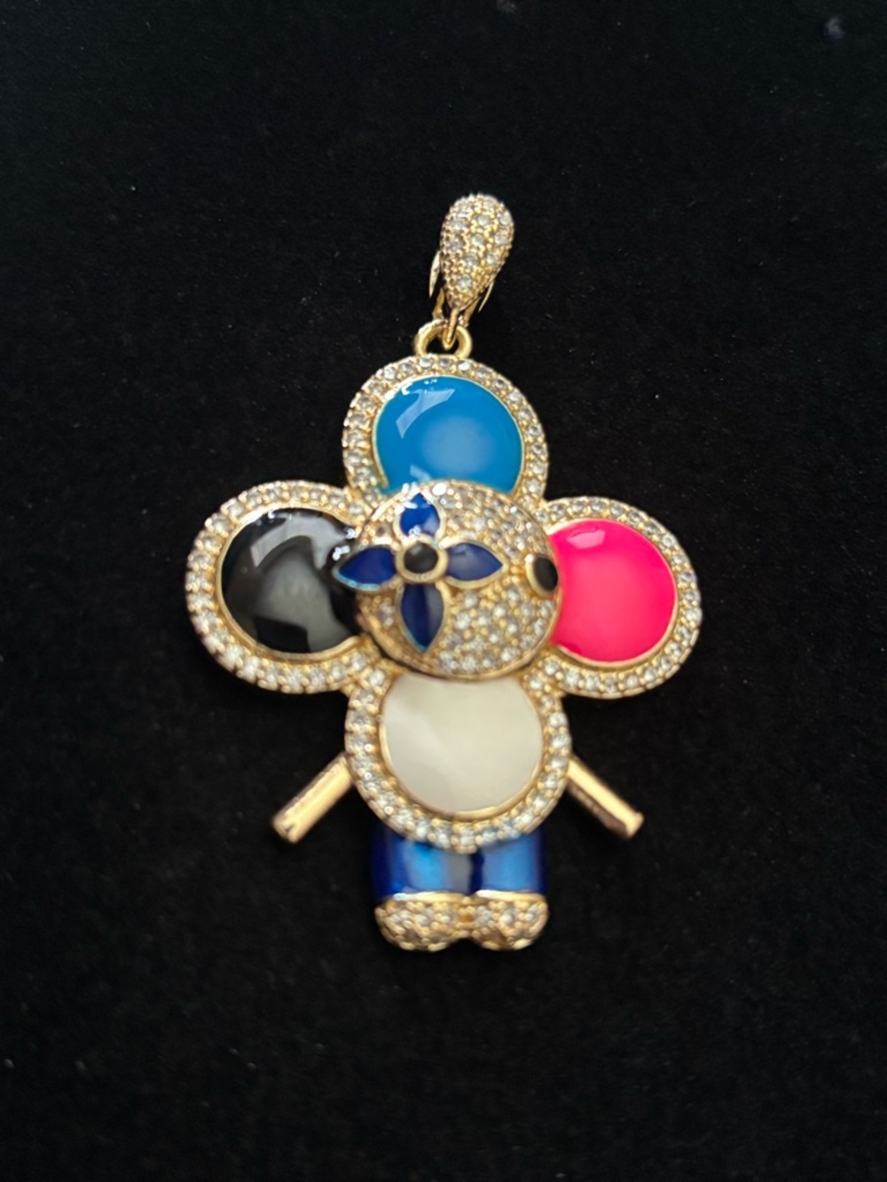 Gold plated doll inspired pendant